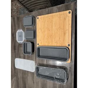 Tidy Board cutting board with scrap and storage accessories